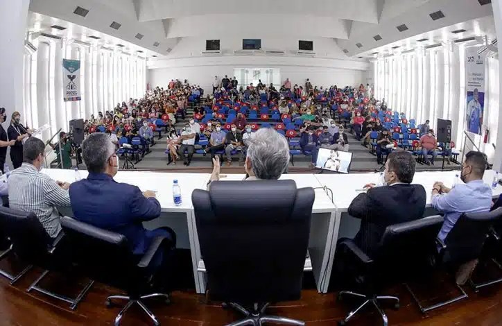 Action and Prevention programme event: a panel addressing a full auditorium